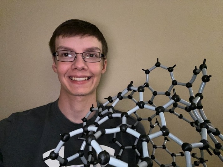 Jacob
                              Willower with his model of Schwartz
                              P-surface